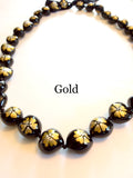 Kukui Nut Lei with Gold Flowers