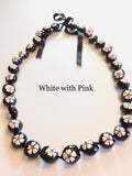 Kukui Nut Lei with White Flowers and Pink Center